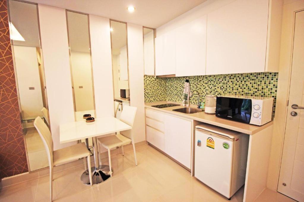 Amazon Residence By Pattaya Sunny Rentals Джомтьен Номер фото
